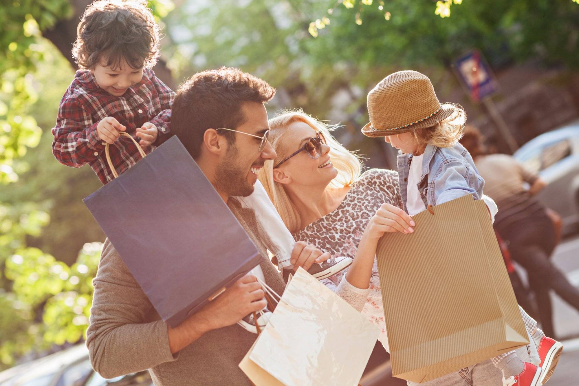 Photo of a young beautiful family enjoying shopping Photo of a young beautiful family enjoying shopping