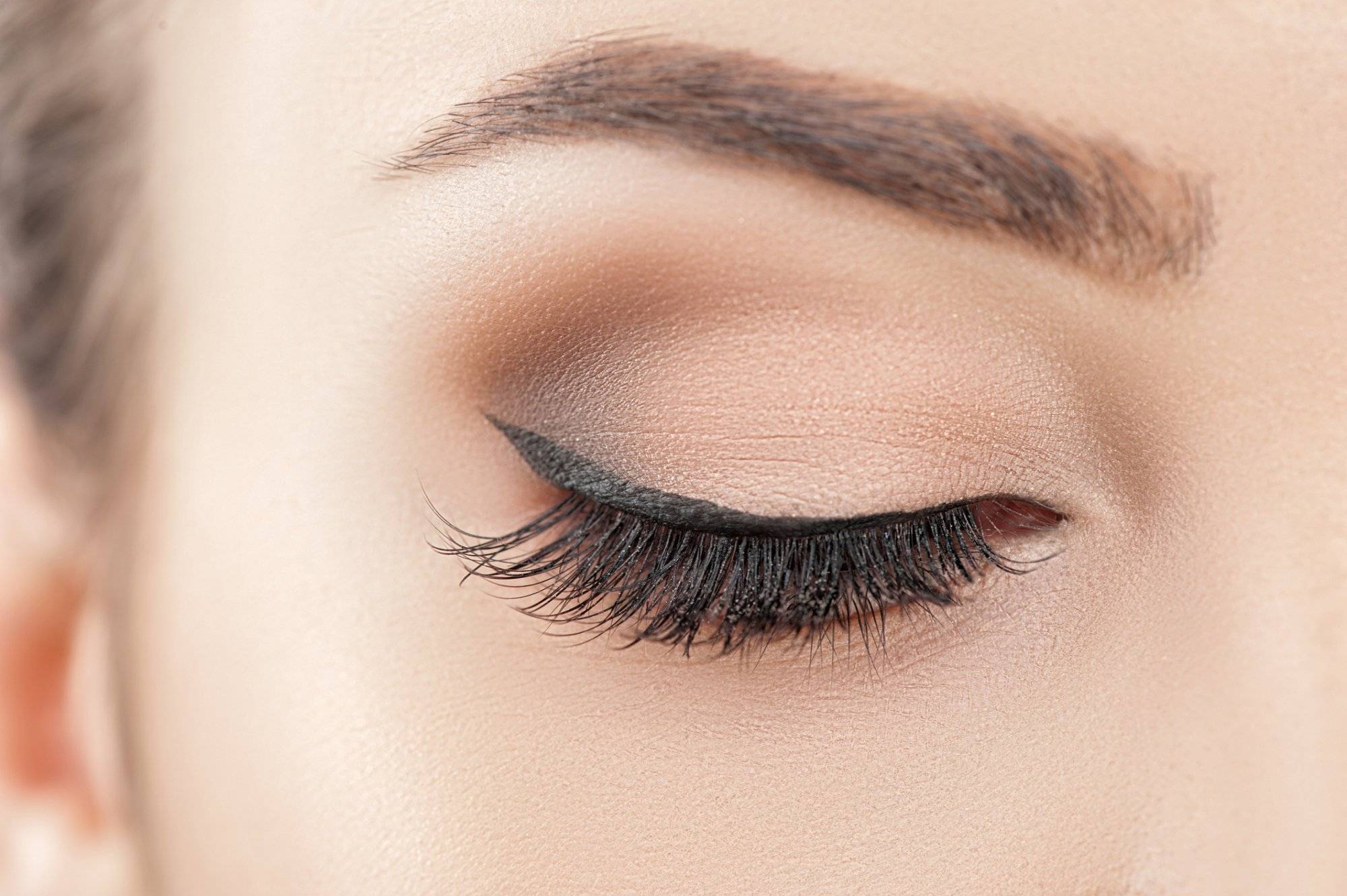 Cheerful young woman with beautiful make-up Cheerful young woman with beautiful make-up