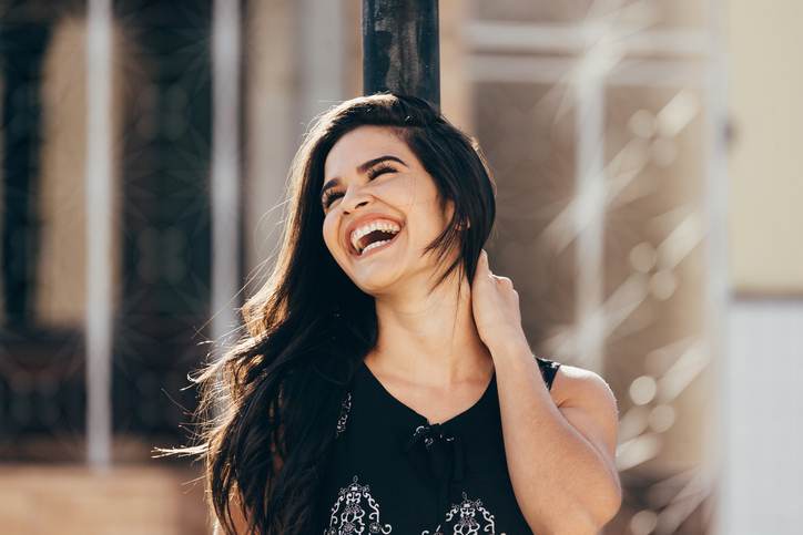 Portrait happy smiling woman outdoors Portrait happy smiling woman outdoors